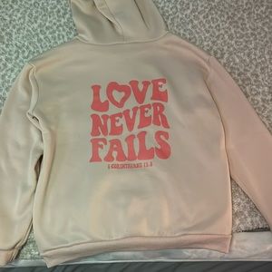 Love Never Fails Hoodie
